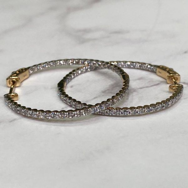 Aretes or amarillo con brillantes