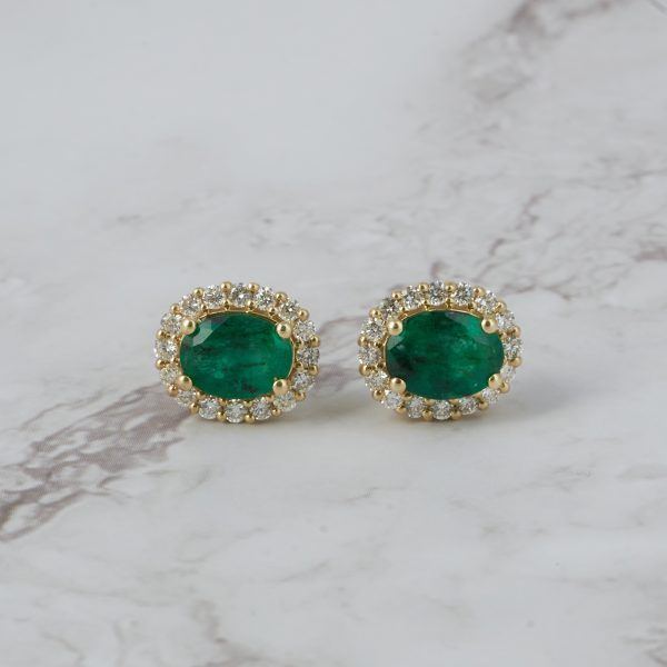 Aretes oro amarillo con brillantes y esmeralda
